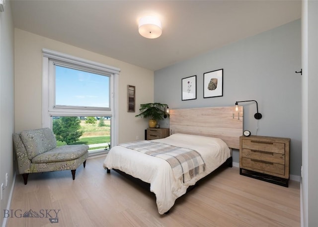476 Enterprise Blvd Unit 207, Bozeman, MT 59718 - bedroom with wood finished floors
