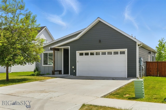 110 Ramshorn Peak Ln, Bozeman, MT 59718 - view of front of property featuring a garage, board and batten siding, and driveway