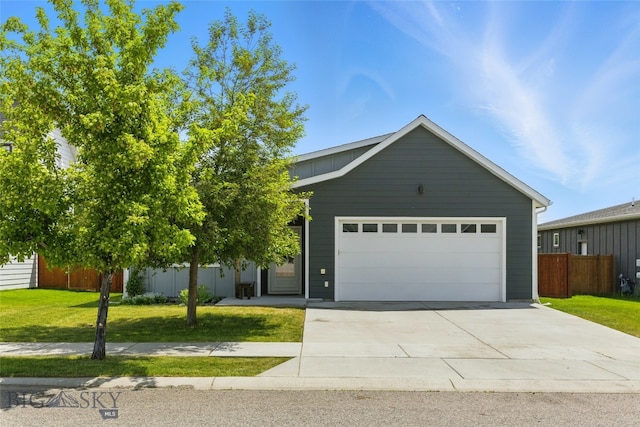 110 Ramshorn Peak Ln, Bozeman, MT 59718 - view of front of home with driveway and an attached garage