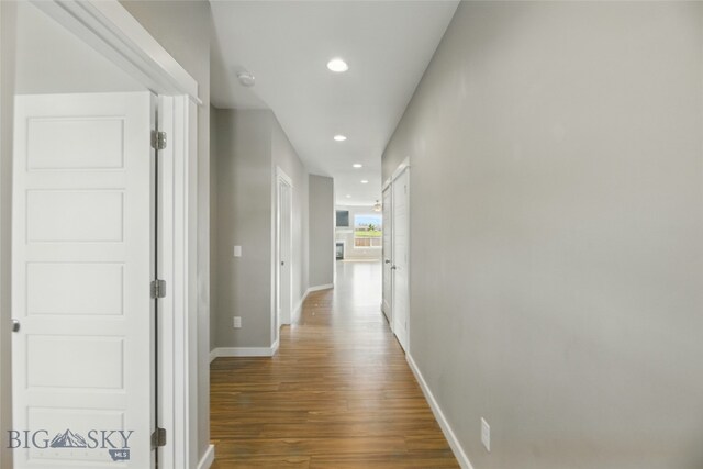 110 Ramshorn Peak Ln, Bozeman, MT 59718 - hallway featuring wood finished floors, baseboards, and recessed lighting