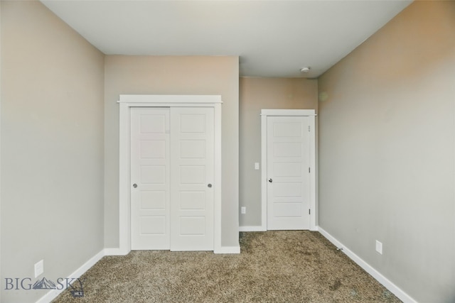 110 Ramshorn Peak Ln, Bozeman, MT 59718 - unfurnished bedroom featuring carpet, baseboards, and a closet