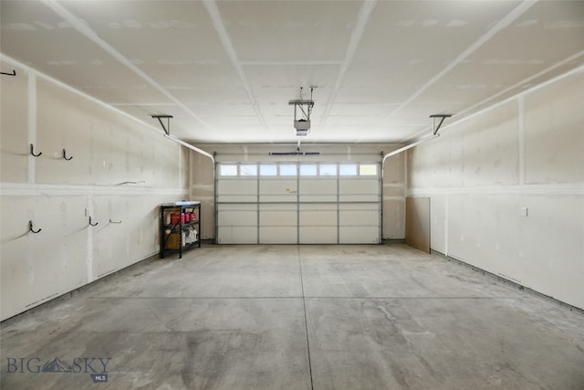 110 Ramshorn Peak Ln, Bozeman, MT 59718 - garage featuring a garage door opener