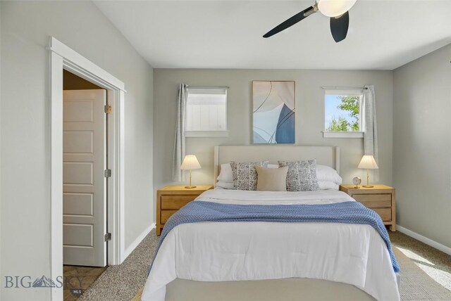 110 Ramshorn Peak Ln, Bozeman, MT 59718 - bedroom featuring baseboards, carpet floors, and a ceiling fan