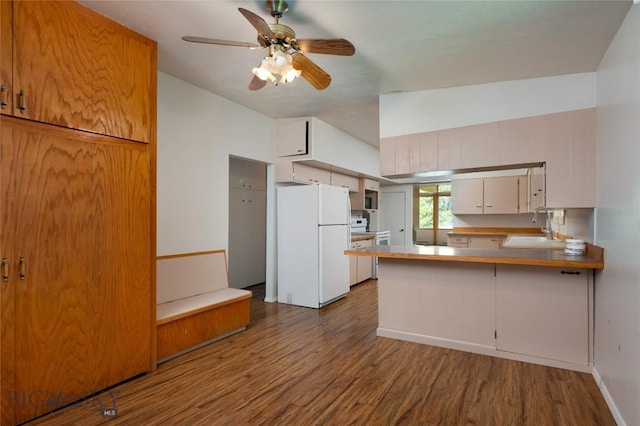 1109 S Willson, Bozeman, MT 59715 - kitchen with white appliances, a sink, wood finished floors, a ceiling fan, and a peninsula
