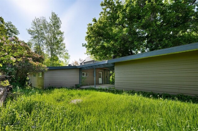 1109 S Willson, Bozeman, MT 59715 - rear view of house featuring a patio area