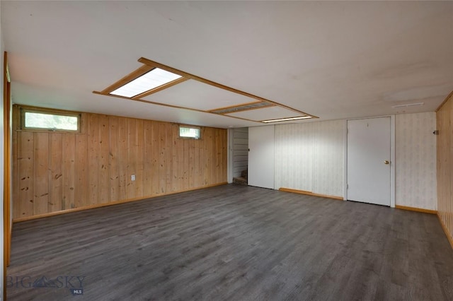 1109 S Willson, Bozeman, MT 59715 - below grade area with wood finished floors, wooden walls, and baseboards
