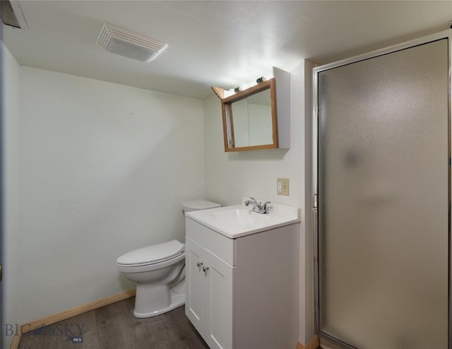 1109 S Willson, Bozeman, MT 59715 - full bath with vanity, wood finished floors, a shower stall, and toilet