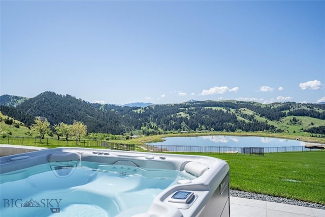 354 Brass Lantern Ct, Bozeman, MT 59715 - mountain view featuring a nearby body of water and a forest