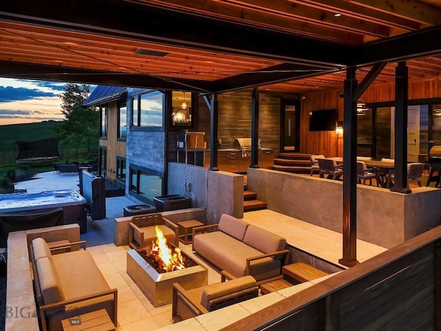 354 Brass Lantern Ct, Bozeman, MT 59715 - view of patio with an outdoor living space with a fire pit
