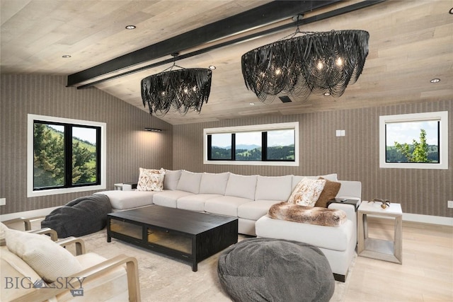 354 Brass Lantern Ct, Bozeman, MT 59715 - living area featuring wallpapered walls, a chandelier, light wood-style floors, and baseboards