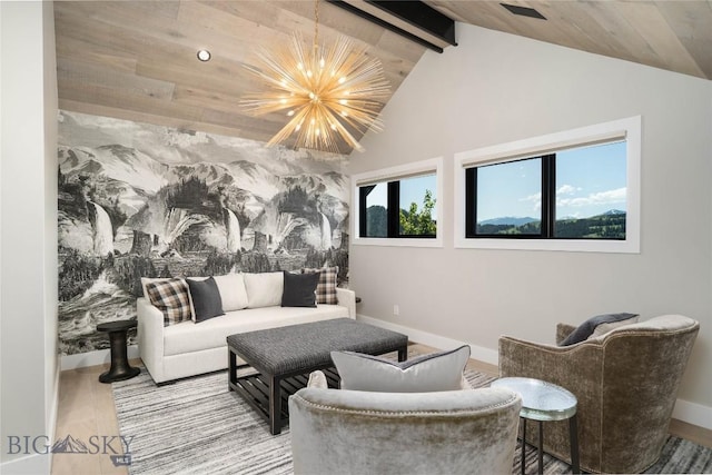 354 Brass Lantern Ct, Bozeman, MT 59715 - living room with beam ceiling, baseboards, and high vaulted ceiling