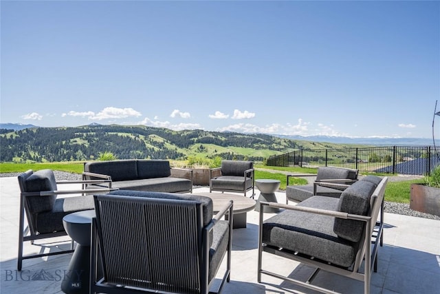 354 Brass Lantern Ct, Bozeman, MT 59715 - view of patio featuring an outdoor hangout area and a mountain view