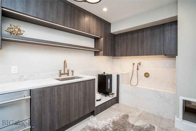 354 Brass Lantern Ct, Bozeman, MT 59715 - washroom featuring a sink and light tile patterned flooring