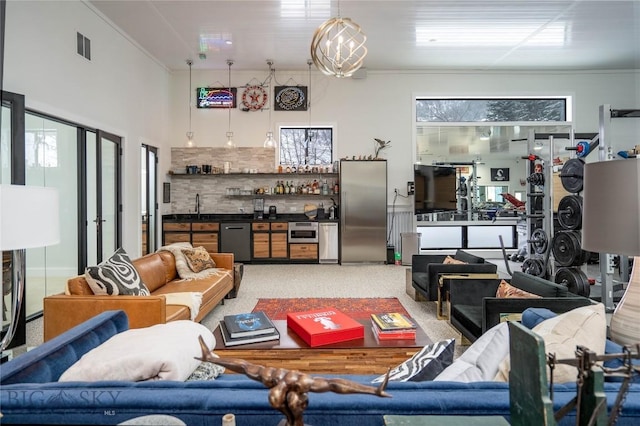 354 Brass Lantern Ct, Bozeman, MT 59715 - living area with wet bar and ornamental molding