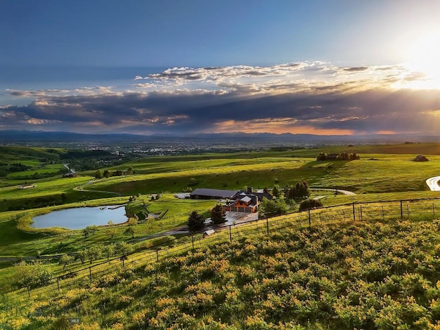 354 Brass Lantern Ct, Bozeman, MT 59715 - aerial view at dusk of a water view and a view of rural / pastoral area