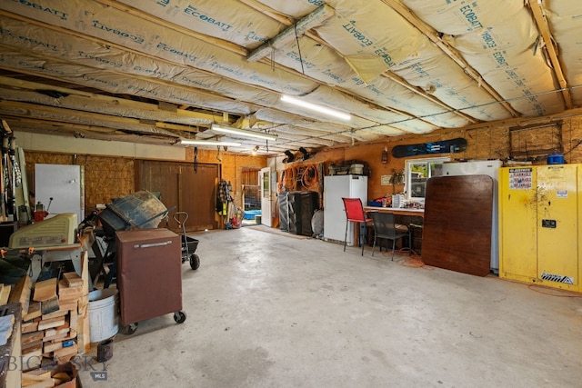 234 Mill Creek Rd, Sheridan, MT 59749 - garage with freestanding refrigerator