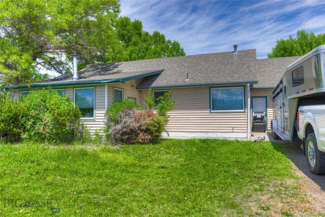 4555 Baxter, Bozeman, MT 59718 - single story home with a front lawn and a shingled roof