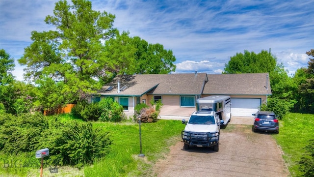 4555 Baxter, Bozeman, MT 59718 - single story home with asphalt driveway, an attached garage, and a front lawn