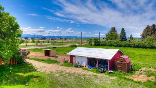 4555 Baxter, Bozeman, MT 59718 - surrounding community featuring an outbuilding, a mountain view, and a pole building