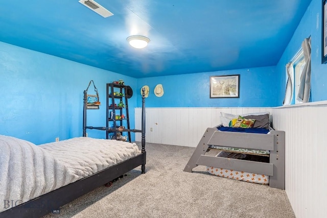 251 Price Rd, Three Forks, MT 59752 - bedroom with carpet floors and a wainscoted wall