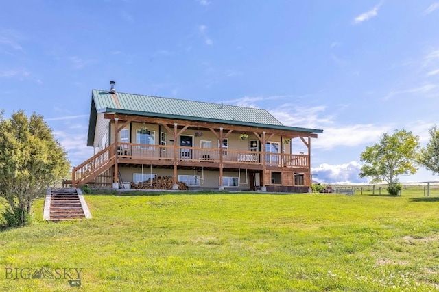 251 Price Rd, Three Forks, MT 59752 - rear view of property featuring a yard, stairway, and metal roof