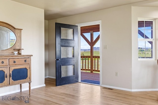 251 Price Rd, Three Forks, MT 59752 - foyer entrance with light wood-style floors and baseboards