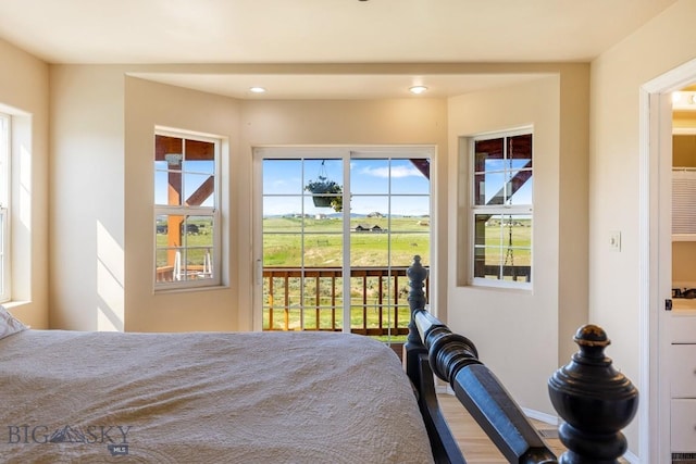 251 Price Rd, Three Forks, MT 59752 - bedroom featuring access to exterior and recessed lighting