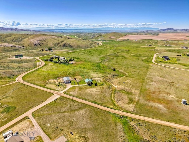 251 Price Rd, Three Forks, MT 59752 - aerial overview of property's location featuring rural landscape and a mountain backdrop