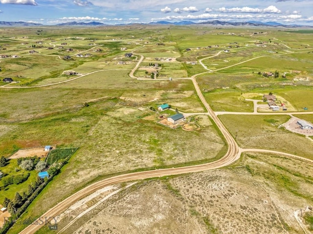 251 Price Rd, Three Forks, MT 59752 - aerial view of property and surrounding area with a mountain backdrop and rural landscape