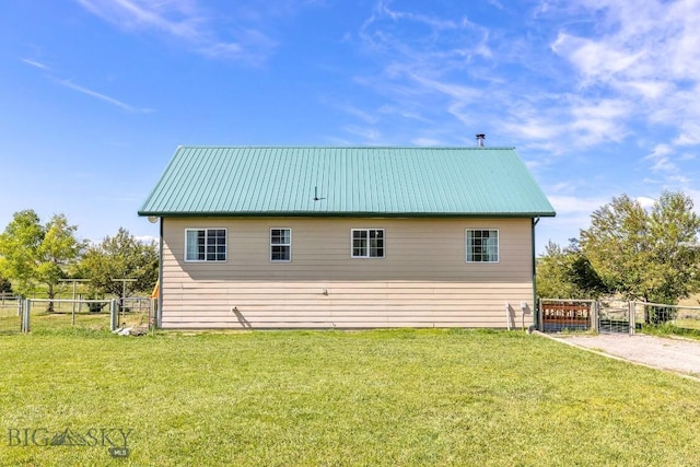 251 Price Rd, Three Forks, MT 59752 - back of property featuring a gate and metal roof