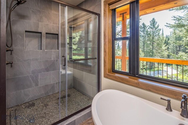 TBD Buttermilk Court, West Yellowstone, MT 59758 - bathroom with a soaking tub and a shower stall