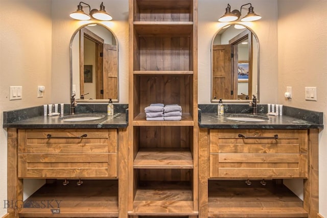 TBD Buttermilk Court, West Yellowstone, MT 59758 - bathroom featuring two vanities and a textured wall