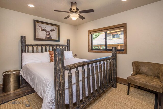 TBD Buttermilk Court, West Yellowstone, MT 59758 - bedroom with recessed lighting, wood finished floors, baseboards, and ceiling fan