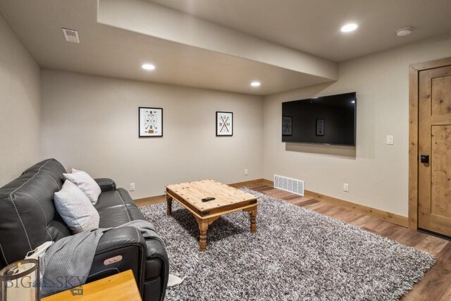 TBD Buttermilk Court, West Yellowstone, MT 59758 - living area with wood finished floors, baseboards, and recessed lighting