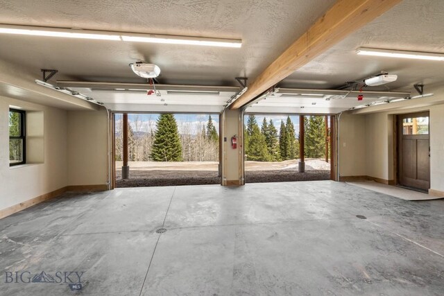 TBD Buttermilk Court, West Yellowstone, MT 59758 - garage with a garage door opener and baseboards