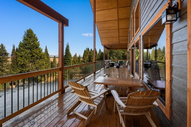 TBD Buttermilk Court, West Yellowstone, MT 59758 - wooden deck featuring outdoor dining space