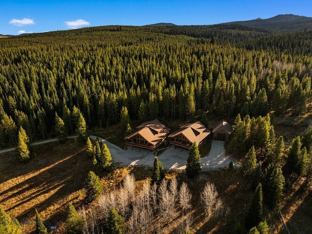 TBD Buttermilk Court, West Yellowstone, MT 59758 - aerial view of property and surrounding area with a forest and a mountain backdrop