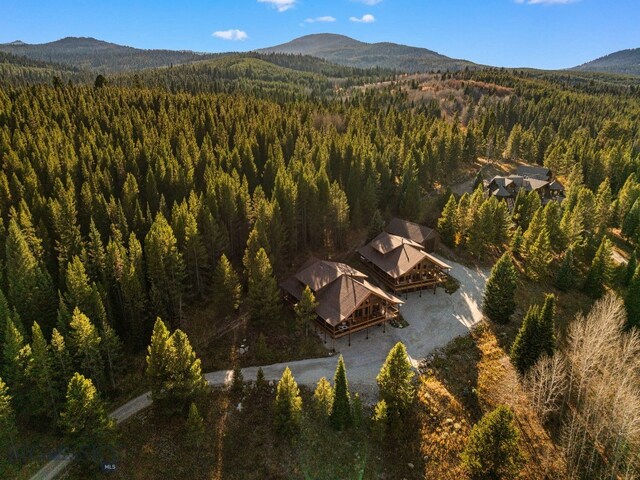 TBD Buttermilk Court, West Yellowstone, MT 59758 - view of property location with a forest and a mountain backdrop
