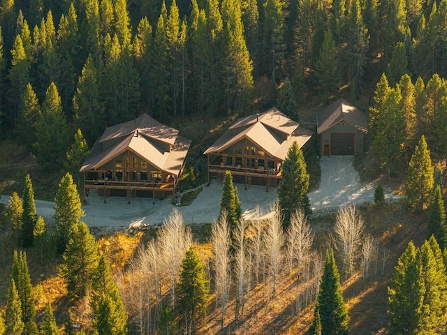 TBD Buttermilk Court, West Yellowstone, MT 59758 - aerial view of property and surrounding area with a heavily wooded area