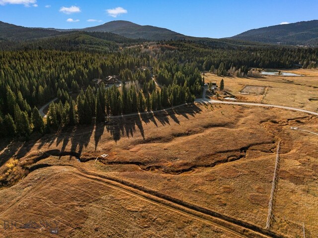 TBD Buttermilk Court, West Yellowstone, MT 59758 - mountain view featuring a heavily wooded area