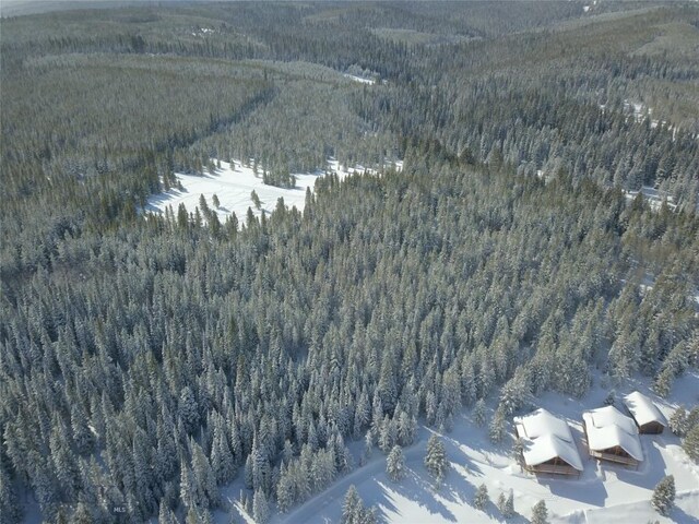 TBD Buttermilk Court, West Yellowstone, MT 59758 - snowy aerial view featuring a forest view