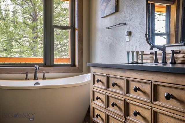 TBD Buttermilk Court, West Yellowstone, MT 59758 - full bathroom with a freestanding bath and a sink