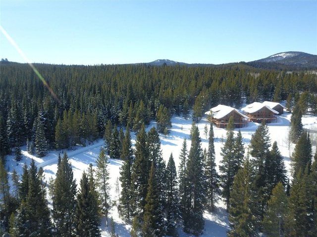 TBD Buttermilk Court, West Yellowstone, MT 59758 - view of mountain backdrop featuring a heavily wooded area
