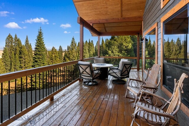 TBD Buttermilk Court, West Yellowstone, MT 59758 - wooden deck featuring outdoor dining space