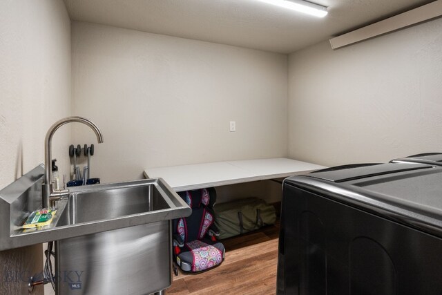 TBD Buttermilk Court, West Yellowstone, MT 59758 - laundry room with washer and dryer and wood finished floors