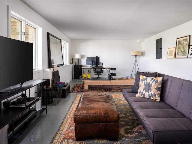 370 Star Ridge Rd, Bozeman, MT 59715 - living area featuring finished concrete flooring and a desk