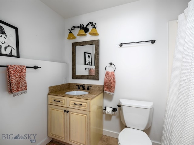 370 Star Ridge Rd, Bozeman, MT 59715 - bathroom featuring vanity, toilet, baseboards, and curtained shower