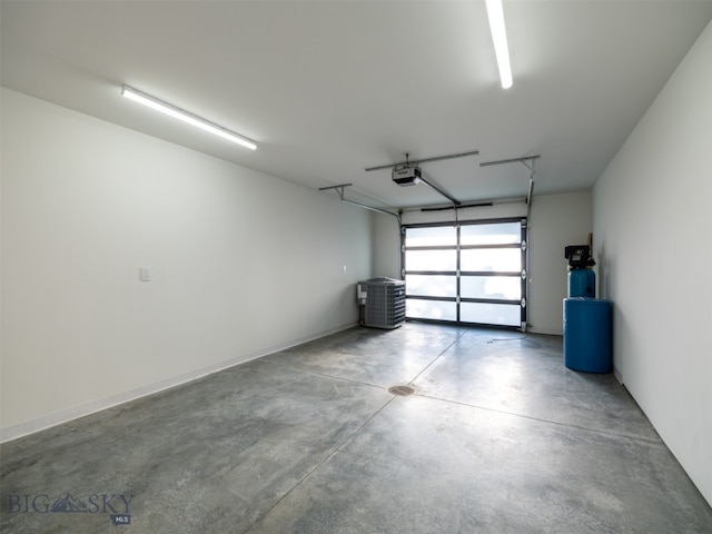 370 Star Ridge Rd, Bozeman, MT 59715 - garage with a garage door opener and cooling unit