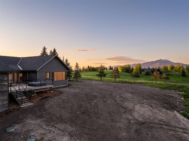 370 Star Ridge Rd, Bozeman, MT 59715 - view of front of property with roof with shingles and a deck with mountain view