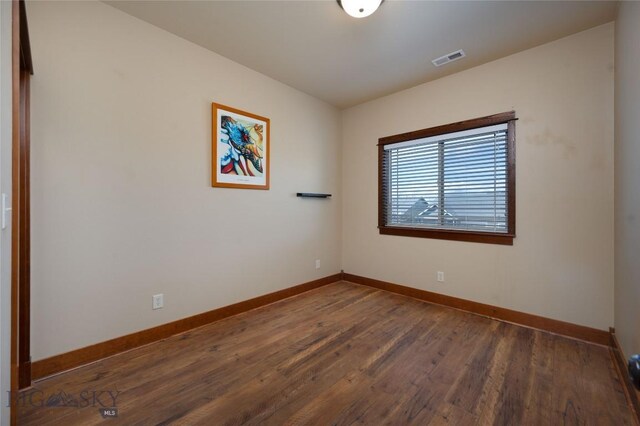 4364 Brookside Ln, Bozeman, MT 59718 - empty room featuring baseboards and wood finished floors